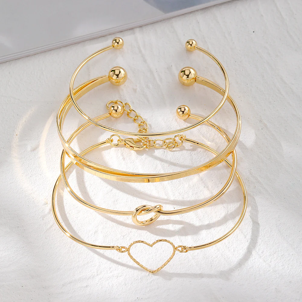 4-Piece Creative Heart Crossed Alloy Bangle Bracelet Set - Image 2