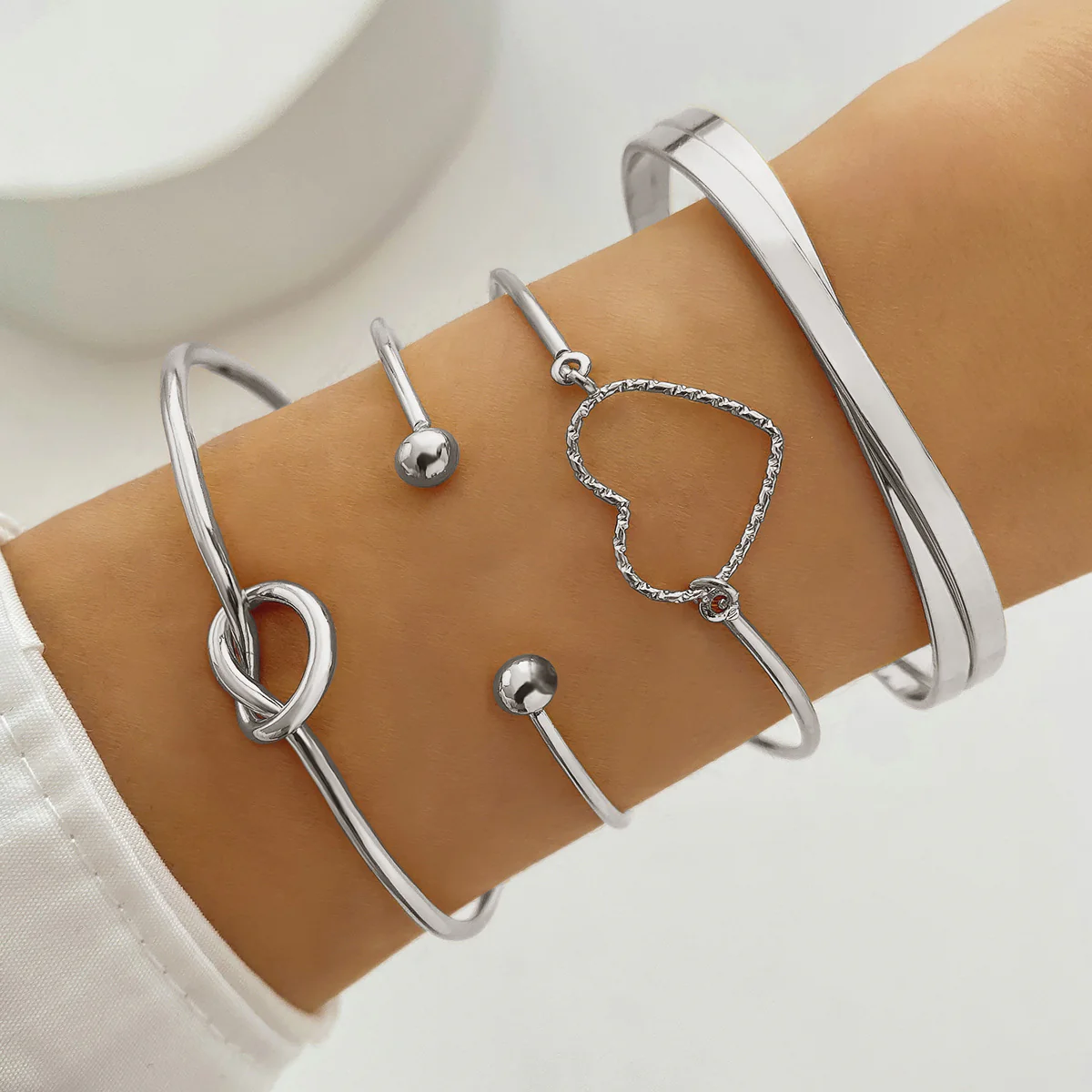 4-Piece Creative Heart Crossed Alloy Bangle Bracelet Set - Image 6