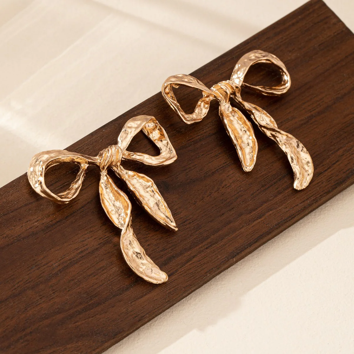 Liquid Irregular Ruched Bow Earrings - Image 11